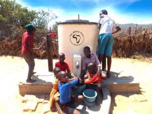 AT-Logo-E-Group-of-children-pumping-water-300x225